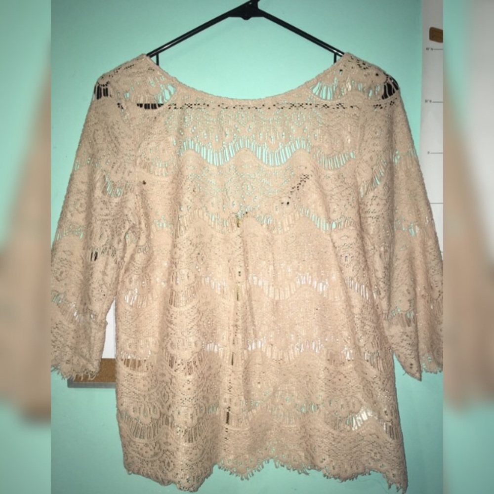 Zara’s See-through top with zipper in the back
